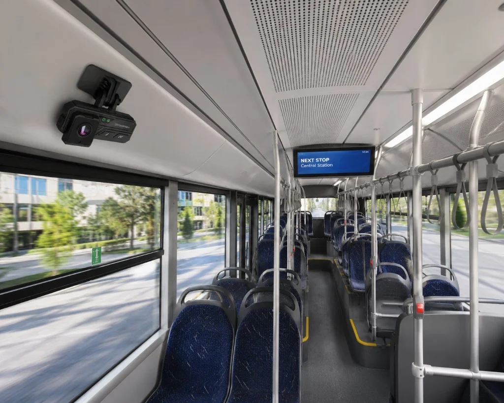 Overhead AI camera mounted inside a transit bus for passenger counting and safety monitoring